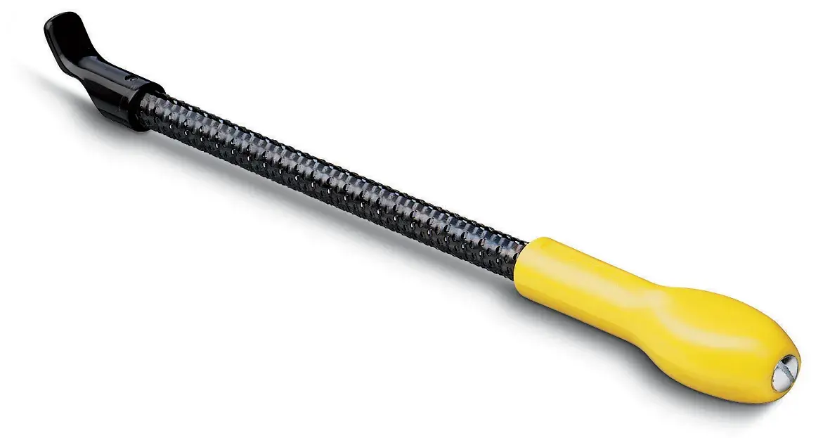 Photo of STANLEY 5-21-297 rasp tool with yellow handle, black blade, angled view on white background.