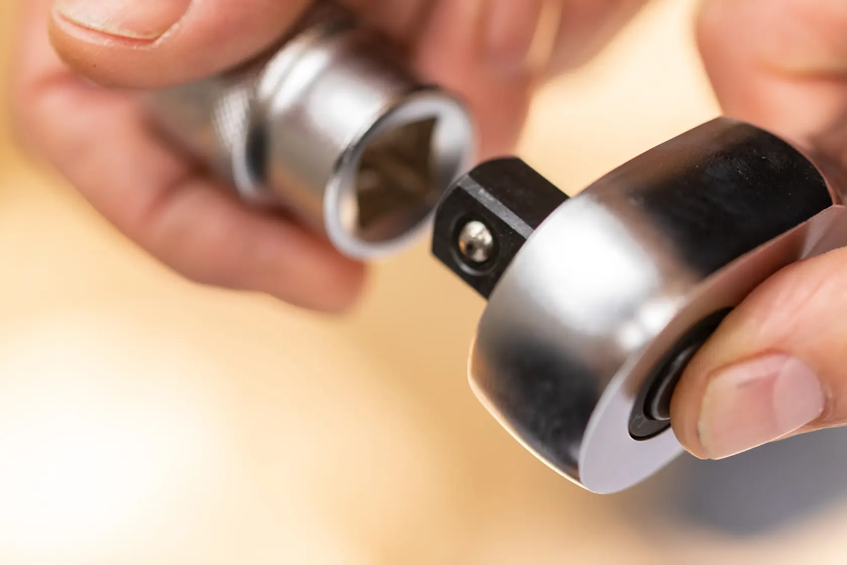 STANLEY FMMT82684-1 socket wrench in use, close-up of metallic tool connection.
